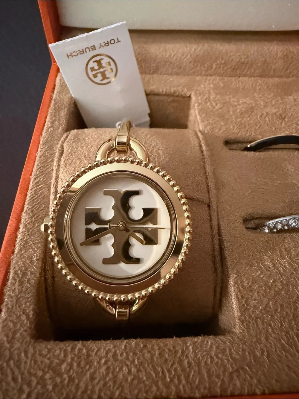 Tory Burch Gold-Tone Logo Dial Bangle Watch with White Face